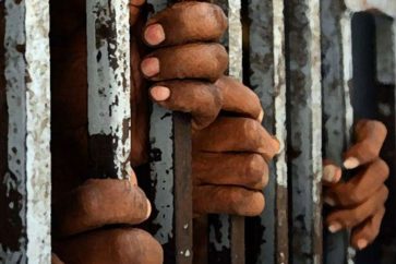 Prisoners behind bars
