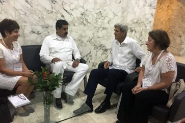 U.S. Secretary of State John Kerry meets with Venezuela president Nicolas Maduro in Cartagena, Colombia Monday, Sept. 26, 2016. (AP Photo/Vivian Salama)