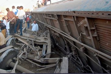 People gather at the site of a train accident near Hyderabad, Pakistan, on Friday 02 February 2007
