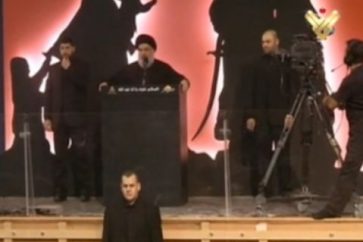 Sayyed Nasrallah delivering a speech during Ahura ceremony