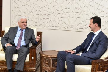 National Security Adviser in the Iraqi government and President of Popular Mobilization Forces, Faleh al-Fayyad (L), Syrian President Bashar al-Assad (R)