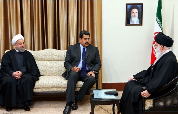 Leader receiving Venezuelan president in the presence of the Iranian president Rouhani