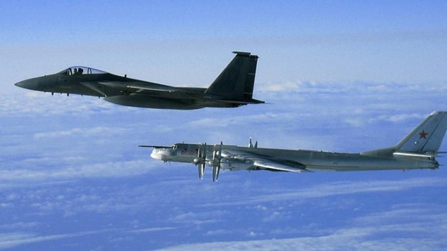 Illustrative photo of an American F-15 intercepting a Russian Tu-95 Bear Bomber during a Russian exercise near the west coast of Alaska in 2008. (US Air Force/Wikimedia Commons)