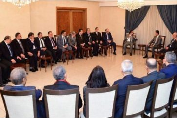 Syrian President Bashar Assad receiving the Arab Lawyers delegation