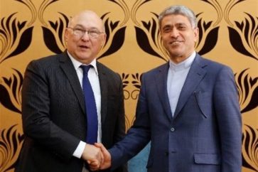 French Finance Minister Michel Sapin with Iranian counterpart Ali Tayebnia
