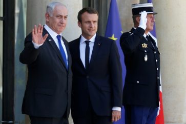 French President Emmanuel Macron and Zionist Prime Minister Benjamin Netanyahu