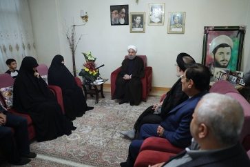 Rouhani visits Iranian martyrs families
