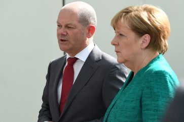 Germany's Chancellor Angela Merkel and Finance Minister Olaf Scholz