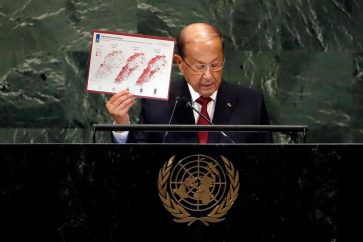 The Associated PressLebanon's President Michel Aoun holds a map of Syria Refugee Response as he addresses the 73rd session of the United Nations General Assembly, at U.N. headquarters, Wednesday, Sept. 26, 2018. (AP Photo/Richard Drew)