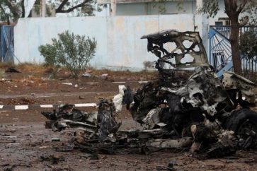 This picture taken on September 13, 2018 shows the wreckage of a car reportedly destroyed in an airstrike near the eastern entrance to the Yemeni port city of Hodeidah. (Photo by AFP)