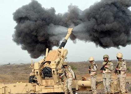 Saudi army artillery fire shells towards Yemen from a post close to the Saudi-Yemeni border, in southwestern Saudi Arabia, on April 13, 2015 . Saudi Arabia is leading a coalition of several Arab countries which since March 26 has carried out air strikes against the Shiite Huthis rebels, who overran the capital Sanaa in September and have expanded to other parts of Yemen. AFP PHOTO / FAYEZ NURELDINE