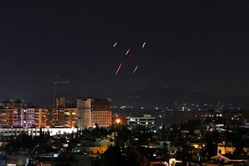 Syria air defenses confronting Israeli missiles