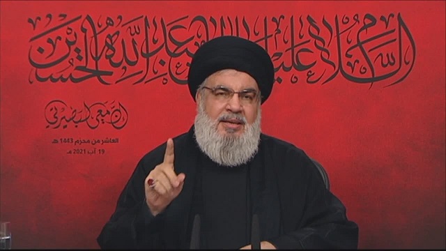Hezbollah Secretary General Sayyed Hasan Nasrallah delivers a speech on the Day of Ashura