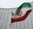 An Iranian flag flutters in front of the IAEA headquarters in Vienna