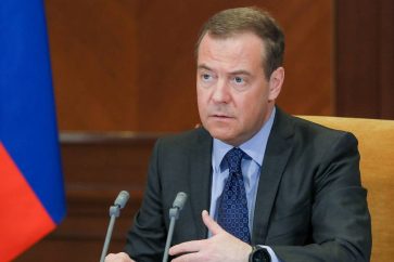 MOSCOW REGION, RUSSIA - OCTOBER 6, 2022: Russian Security Council Deputy Chairman/United Russia Party Chairman Dmitry Medvedev is seen in the Gorki residence as he joins, via videolink, the International Inter-Party Conference on Environmental Policy and Sustainable Development which is taking place in Yuzhno-Sakhalinsk on 6-7 October 2022. Yekaterina Shtukina/POOL/TASSÐîññèÿ. Ìîñêîâñêàÿ îáëàñòü. Ïðåäñåäàòåëü "Åäèíîé Ðîññèè", çàìåñòèòåëü ïðåäñåäàòåëÿ Ñîâåòà áåçîïàñíîñòè ÐÔ Äìèòðèé Ìåäâåäåâ ïðèíèìàåò ó÷àñòèå â ðåæèìå âèäåîêîíôåðåíöèè èç ðåçèäåíöèè "Ãîðêè" â ìåæäóíàðîäíîé ìåæïàðòèéíîé êîíôåðåíöèè "Ýêîëîãè÷åñêàÿ ïîëèòèêà è óñòîé÷èâîå ðàçâèòèå". Åêàòåðèíà Øòóêèíà/POOL/ÒÀÑÑ