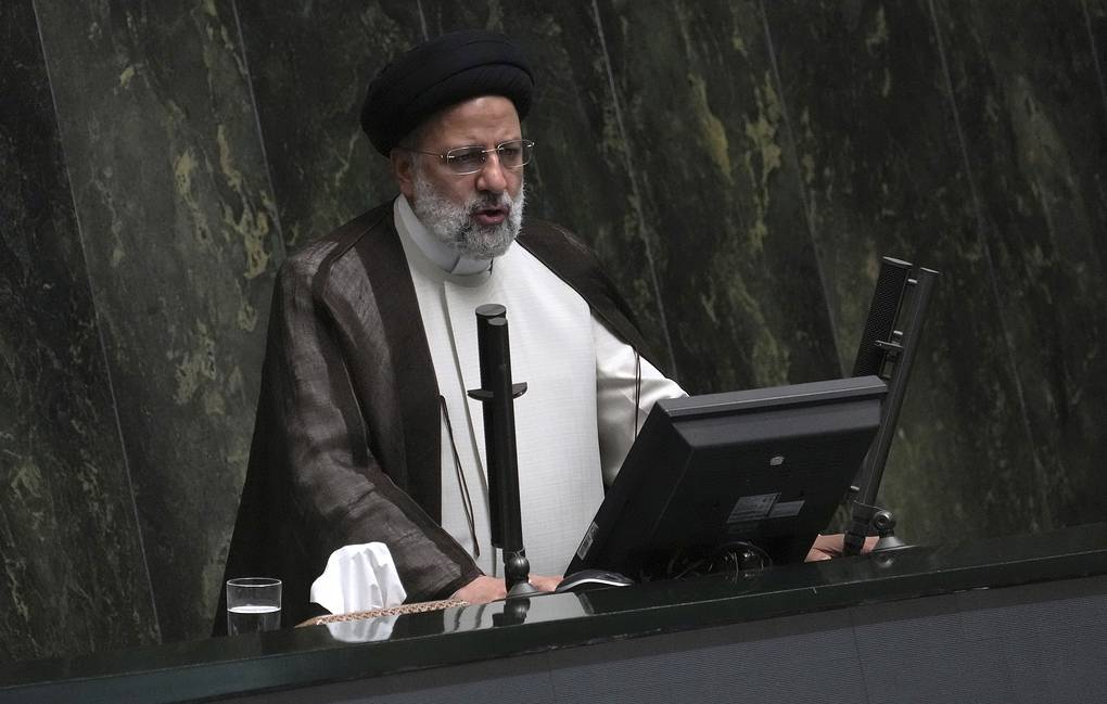 Iranian President Ebrahim Raisi addresses the parliament in a vote of confidence session for his proposed labor minister in Tehran, Iran, Tuesday, Oct. 4, 2022. (AP Photo/Vahid Salemi)