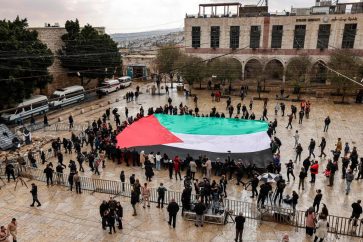 Palestinian flag raised in Bethlehem on Christmas (December 24, 2023).