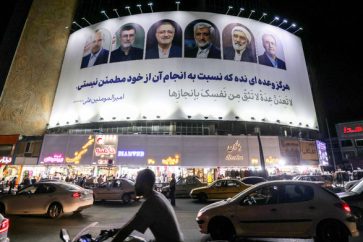 Billboard featuring the six candidates for Iran's upcoming presidential election in Valiasr Square, Tehran