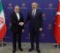 Iranian Foreign Minister Abbas Araghchi (L) shakes hands with his Turkish counterpart Hakan Fidan in Ankara