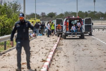 Israeli occupation forces at the scene after a missile fired from Yemen hit an area of Ben Gurion Airport (May 4, 2025).