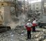Members of Iranian Red Crescent Society’s rescue teams clearing debris at a building destroyed during an Israeli attack in Tehran (June 20, 2025).