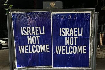 Posters reading 'Israeli not welcome' appeared in several locations in Milan, Italy on June 26, 2025.